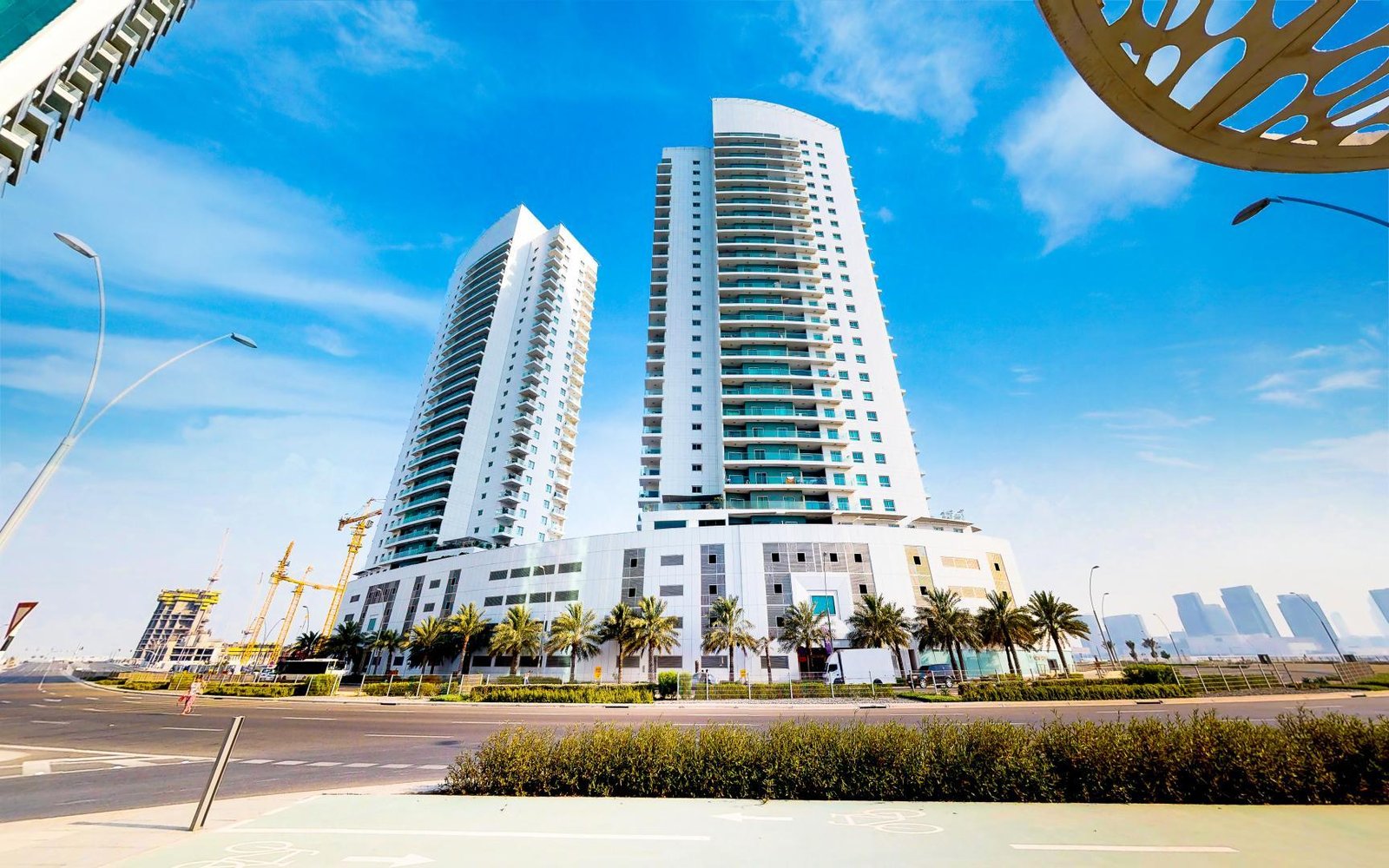 Stunning exterior view of Amaya Towers twin buildings overlooking Arabian Sea in Shams Abu Dhabi